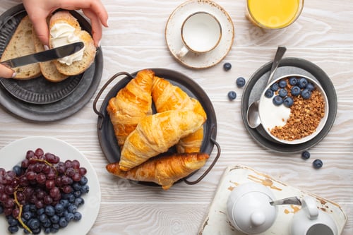 Preview: Traditional morning breakfast food on rustic white wooden background