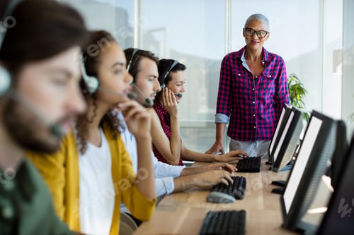 Preview: Customer service executive trainer monitoring her team