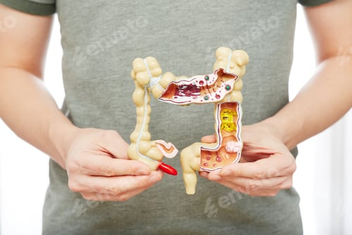 Preview: Man suffering from constipation and abdominal pain. Treatment of colitis, flatulence, indigestion