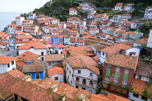 Preview: vast urban landscape filled with numerous buildings and houses in Cudillero, a traditional Asturian