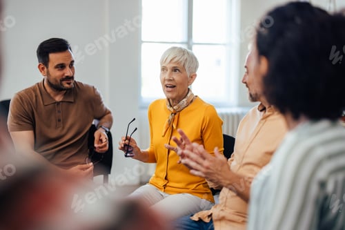 Preview: Group Discussion Session with Diverse Individuals in an Office Setting