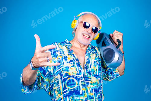 Preview: Grandfather caucasian dancing on colored background