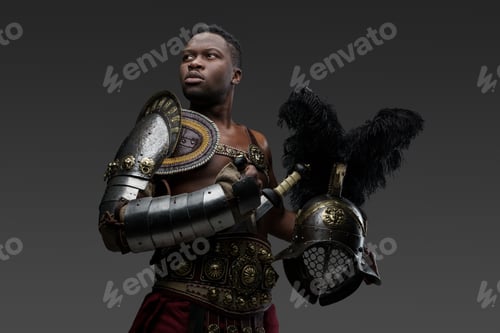 Preview: Handsome black gladiator with feathered helmet dressed in armor