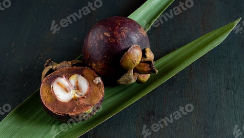 Preview: Mangosteen fruits on wooden table