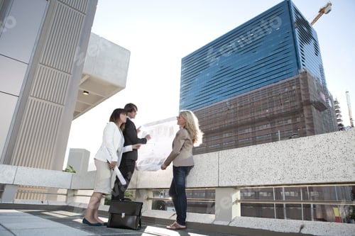 Preview: Businesspeople having a meeting outdoors