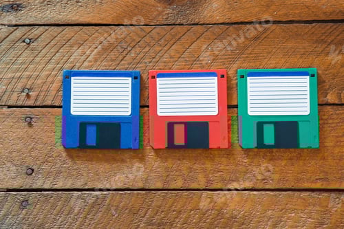 Preview: Three floppy disks as used in the 1980s and 1990s, vintage technology data storage system.