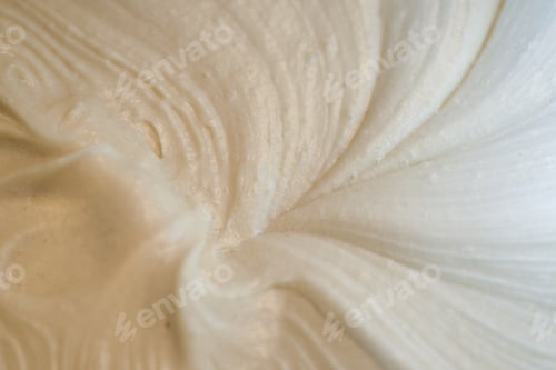 Preview: Textured swirls and peaks of raw cake batter