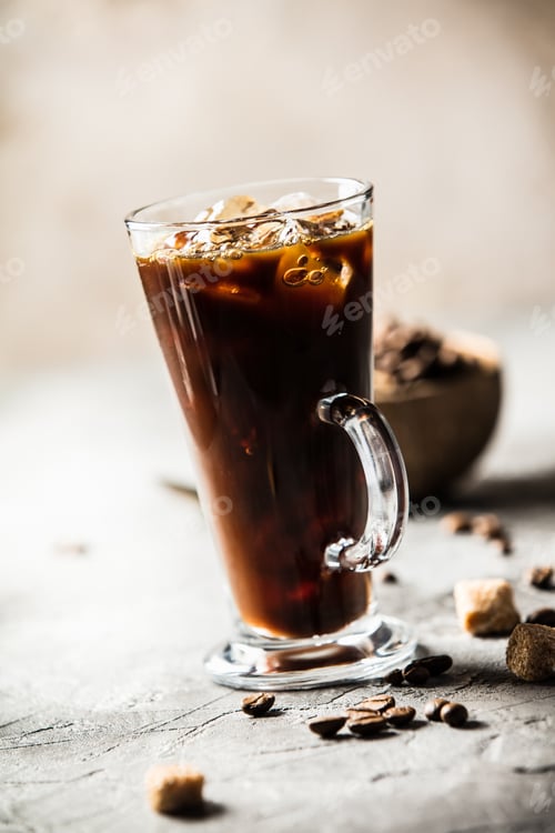 Preview: Iced coffee on rustic table, close up