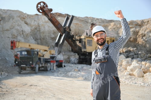 Preview: Male worker with bulldozer in sand quarry