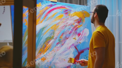 Preview: Artist working on painting