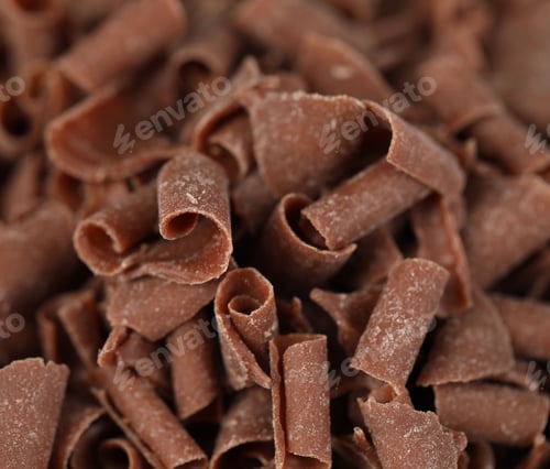 Preview: Many delicious chocolate shavings as background, closeup