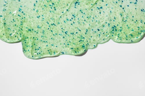 Visualização: Fundo cosmético abstrato de gel líquido. Mancha de produto hidratante transparente
com aloe vera