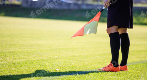 Preview: Football assistant referee during a game