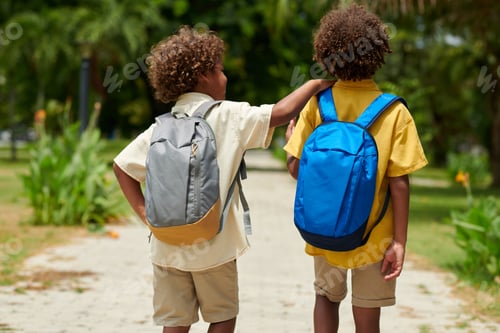 Preview: Kids with Backpacks in Park