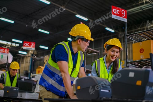 Preview: Blue collar workers are working at warehouse.