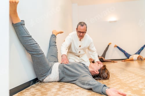 Preview: Women stretching with the guidance of Qi gong instructor