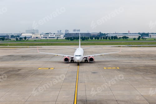 Preview: Airplane taxi in taxiway after landing and prepare to park in passenger gate.