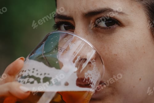 Preview: Girl enjoying a beer