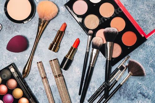 Preview: decorative cosmetics, makeup brushes false eyelashes on a blue background. the view from the top