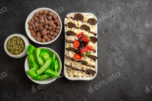 Preview: top view delicious dessert with chocolate cookies and strawberries on a dark background nut biscuit