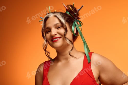 Preview: Young woman with Waardenburg syndrome showcases unique style on vibrant orange backdrop
