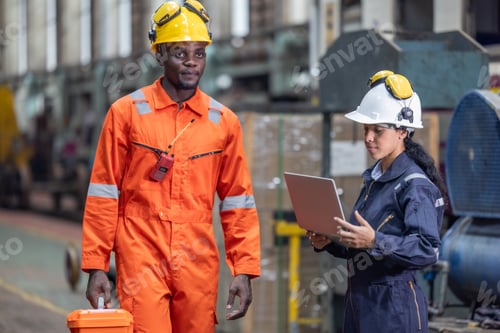 Preview: Engineer supervisor uses laptop for train diagnostics, maintenance, and CO2 reduction discussions.