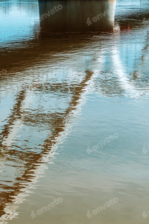 Preview: Modern bridge structure reflecting of the river water surface on sunny spring day