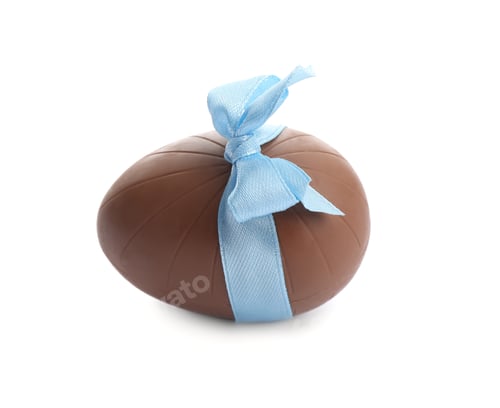 Preview: Chocolate egg with light blue bow isolated on white