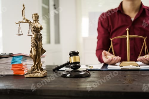 Preview: A male lawyer is working at his desk on online judicial review,focusing on justice,fairness,legal