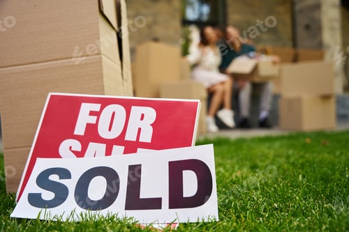 Preview: Signs for sale, sold on a green lawn