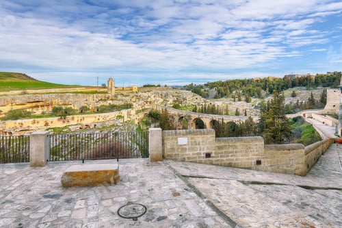 Preview: Breathtaking view on Gravina in Puglia ancient town, bridge and canyon at sunris
