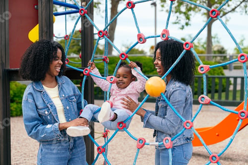 Preview: Twin sisters playing with their niece at the playground