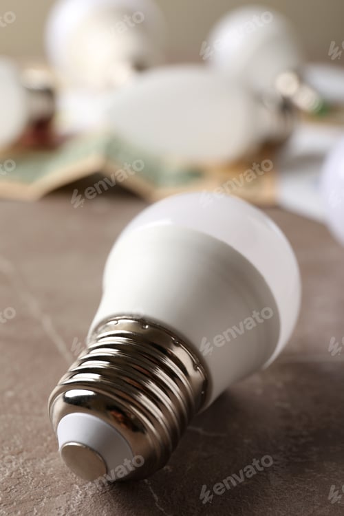 Preview: Energy saving concept on gray textured background