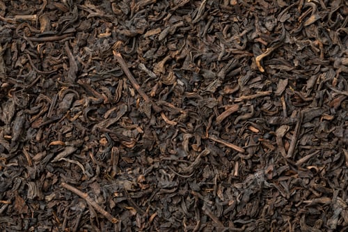 Preview: Chinese Pu Ehr dried tea leaves close up full frame