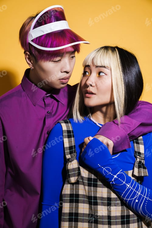 Preview: Asian couple hugging while looking at each other