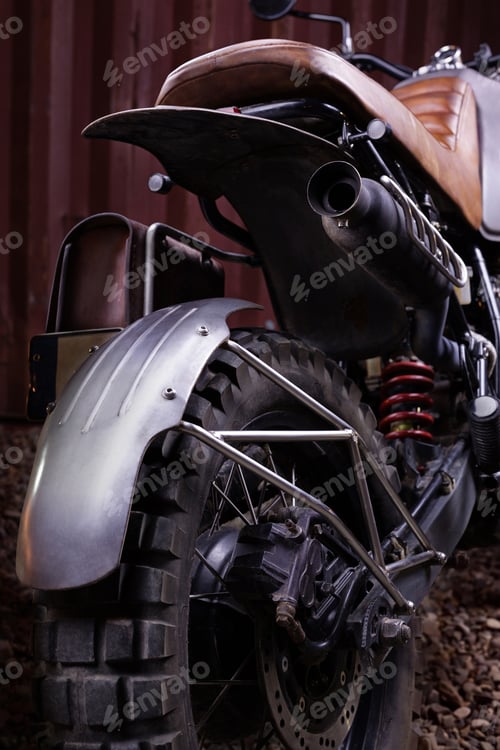 Preview: Custom scrambler motorbike on a rusty container background