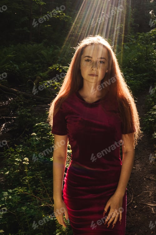 Preview: The young woman in fern forest.