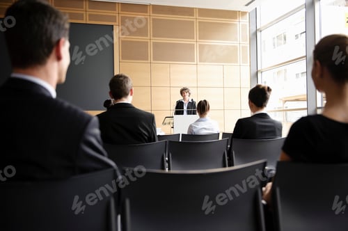 Preview: Business people in seminar