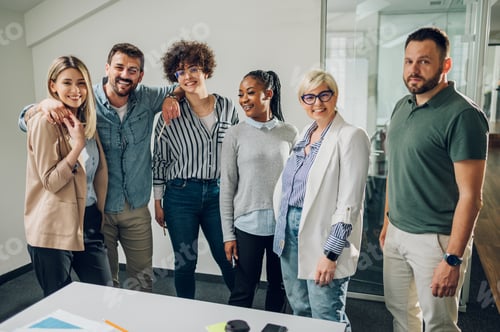 Preview: Group of diverse business people working together and having a meeting