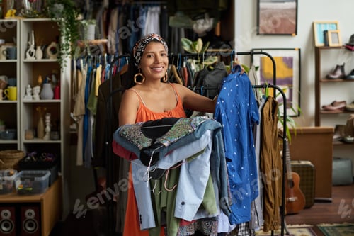Preview: Cheerful customer with secondhand attire