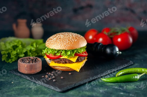 Preview: front view delicious meat hamburger with red tomatoes on dark background color fast-food french
