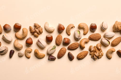 Preview: Flat lay composition with organic mixed nuts on color background