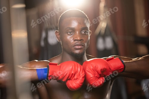 Preview: Boxer fighting through rounds with unwavering determination for victory and the champion title.