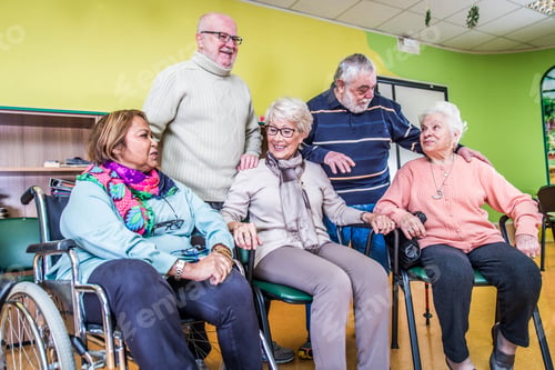 Preview: Group of Seniors Smiling Together Indoors