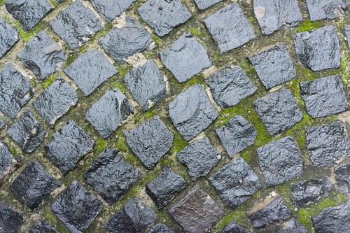 Preview: Background, texture, round vintage stone gray pavers with raindrops