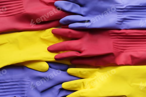 Colorful Rubber Gloves Stacked in Pile Arrangement