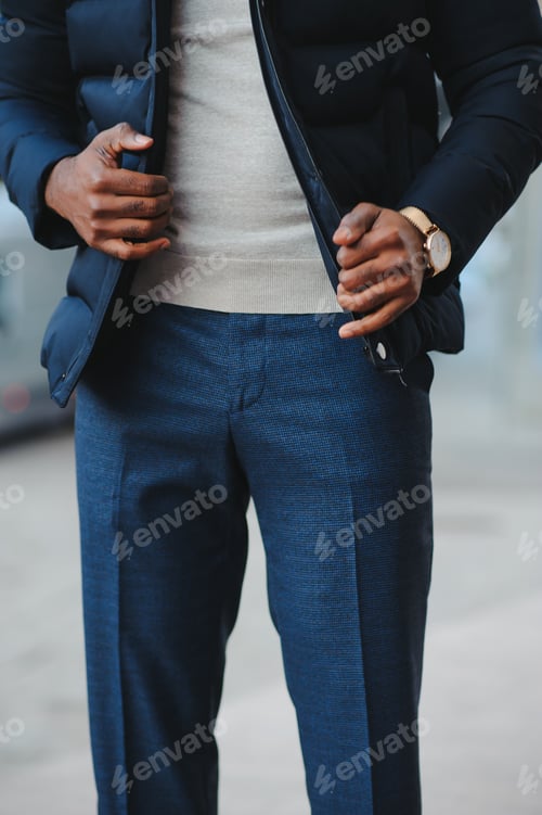 Preview: African American man in stylish new clothes on the street