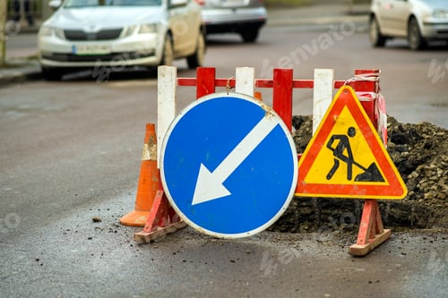 Preview: Warning street sign on road work site.