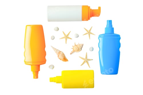 Preview: Colorful sunscreen bottles and beach shells for summer fun, isolated on white