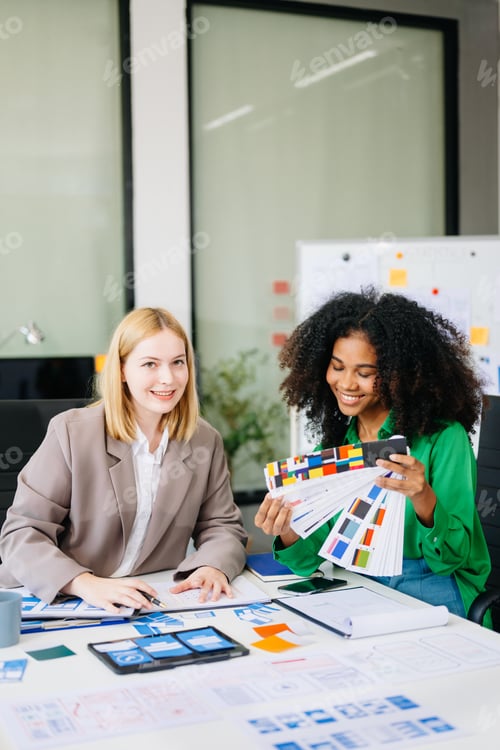 Preview: UX developer and ui designer brainstorming about mobile app interface wireframe design